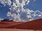 Clouds and dunes at Monument Valley